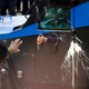Baltimore police officer sprays pepper spray at demonstrators.
